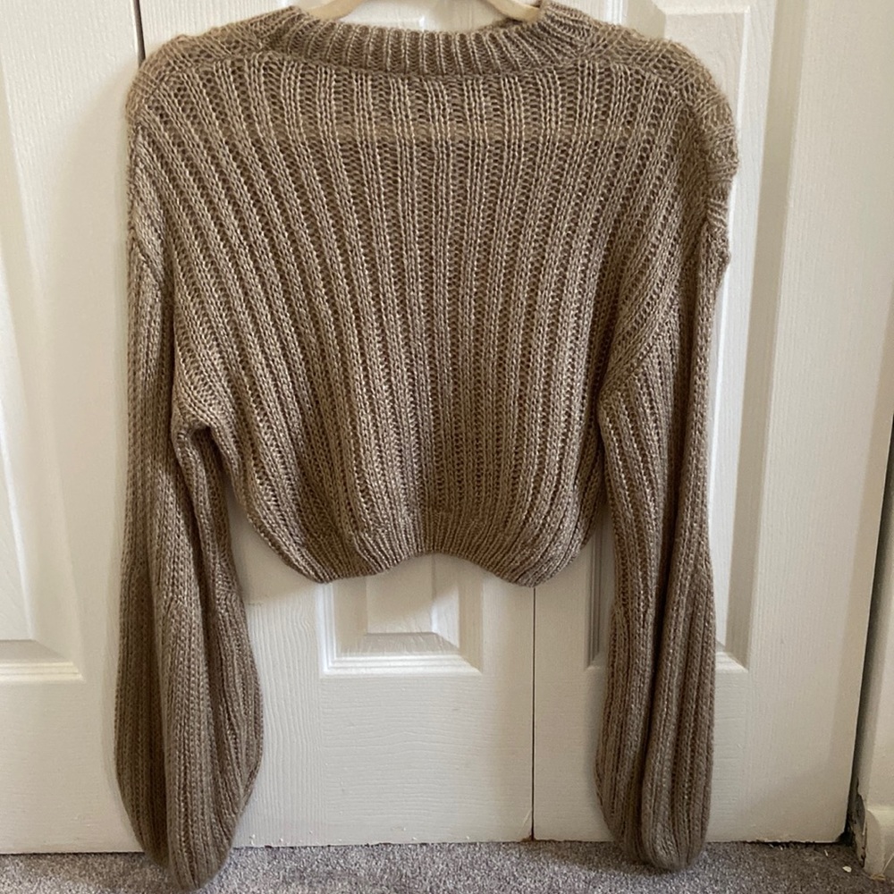 Size small, cropped brownish/tan sweater with balloon sleeves.